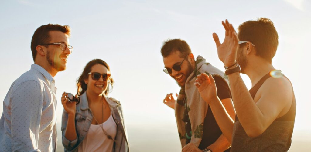 people smiling in the sun