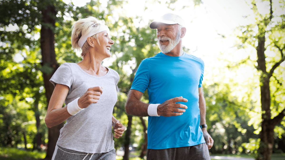 old couple running outdoors