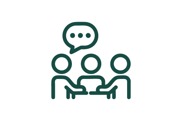 An outlined icon of three stylised human figures sit together with a speech bubble containing three dots above them, symbolising communication or discussion. The design is in dark green against a white background.